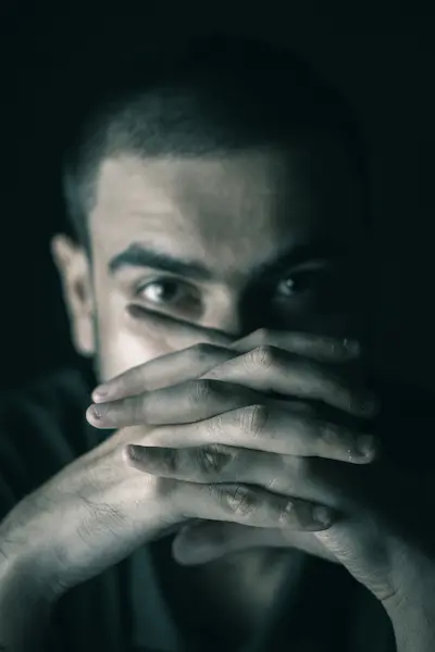 a headshot of a concern men
